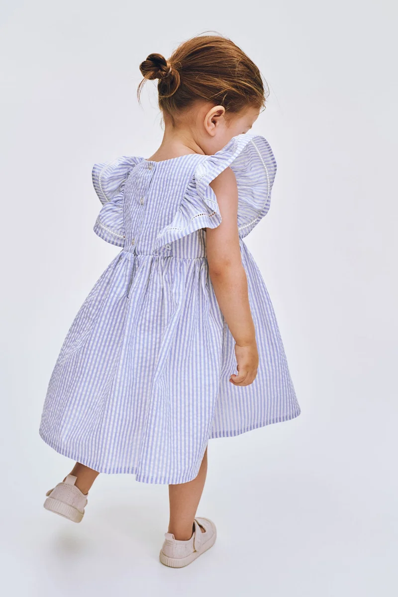 اتش اند ام فستان قطني بحواف مكشكشة