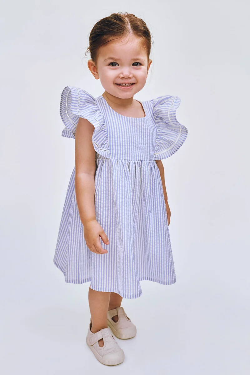 اتش اند ام فستان قطني بحواف مكشكشة