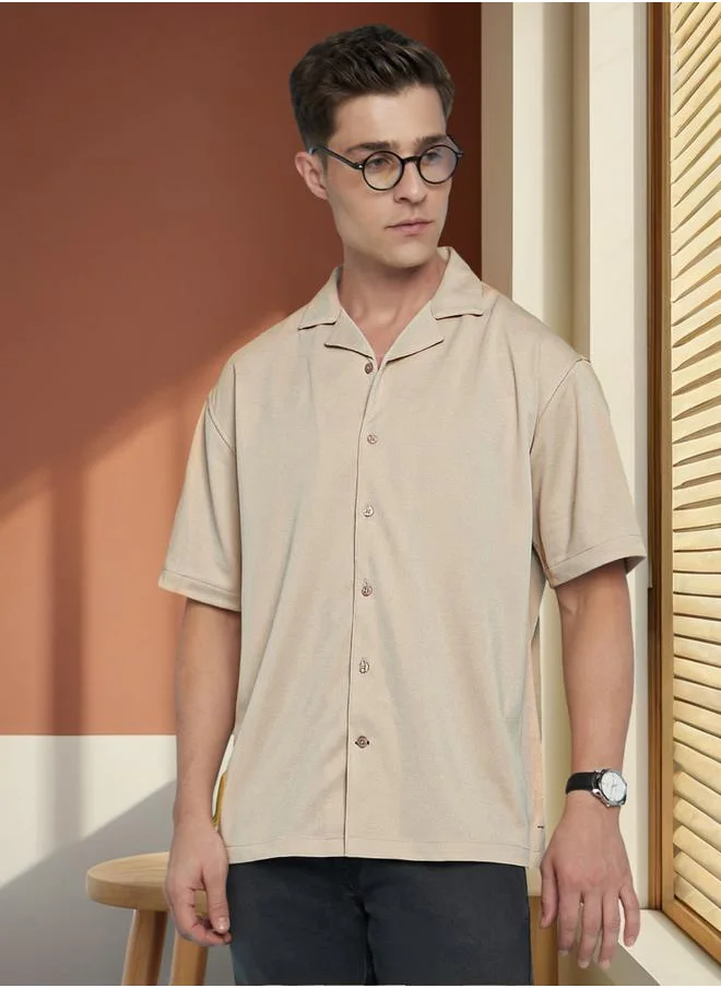 Dennis Lingo Upgrade your wardrobe with this premium Beige Relaxed fit Shirts Textured design crafted from 100% Polyester featuring Half Sleeve with Button closure.