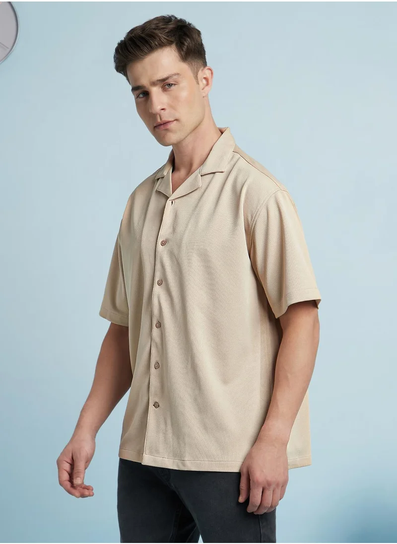 Dennis Lingo Upgrade your wardrobe with this premium Beige Relaxed fit Shirts Textured design crafted from 100% Polyester featuring Half Sleeve with Button closure.