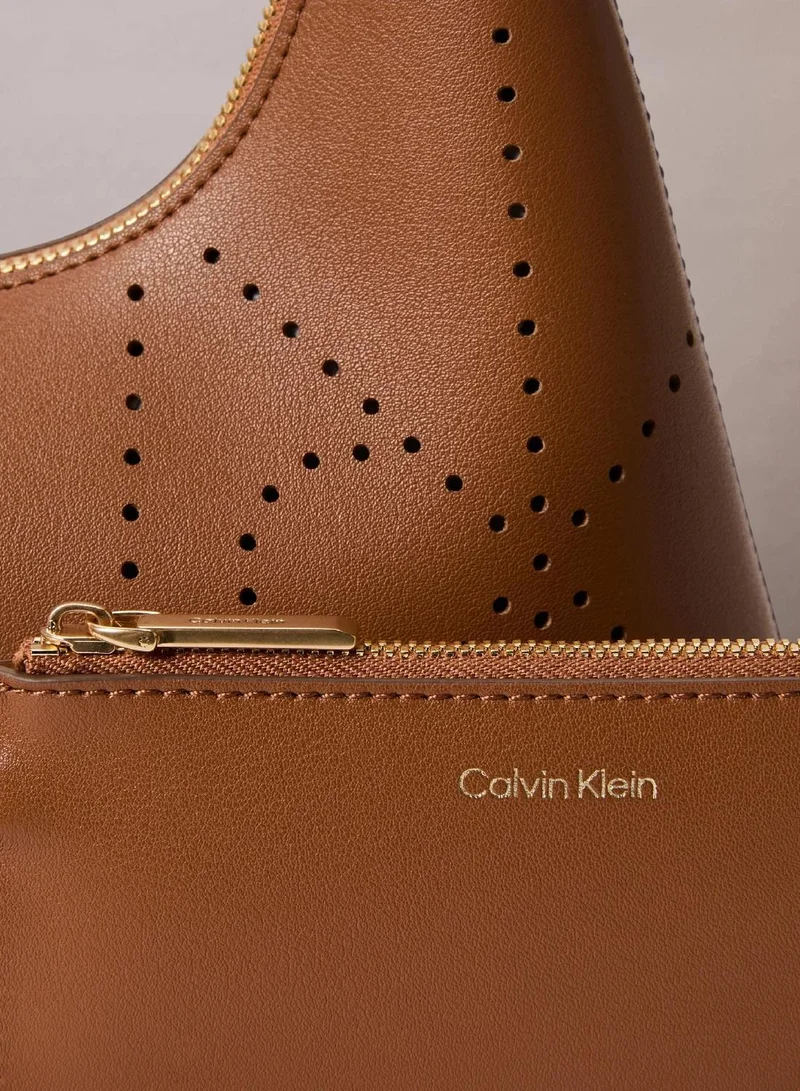 Calvin Klein Argan Oil Perforated Emblem Logo Shoulder Bag for Women | Best Price UAE