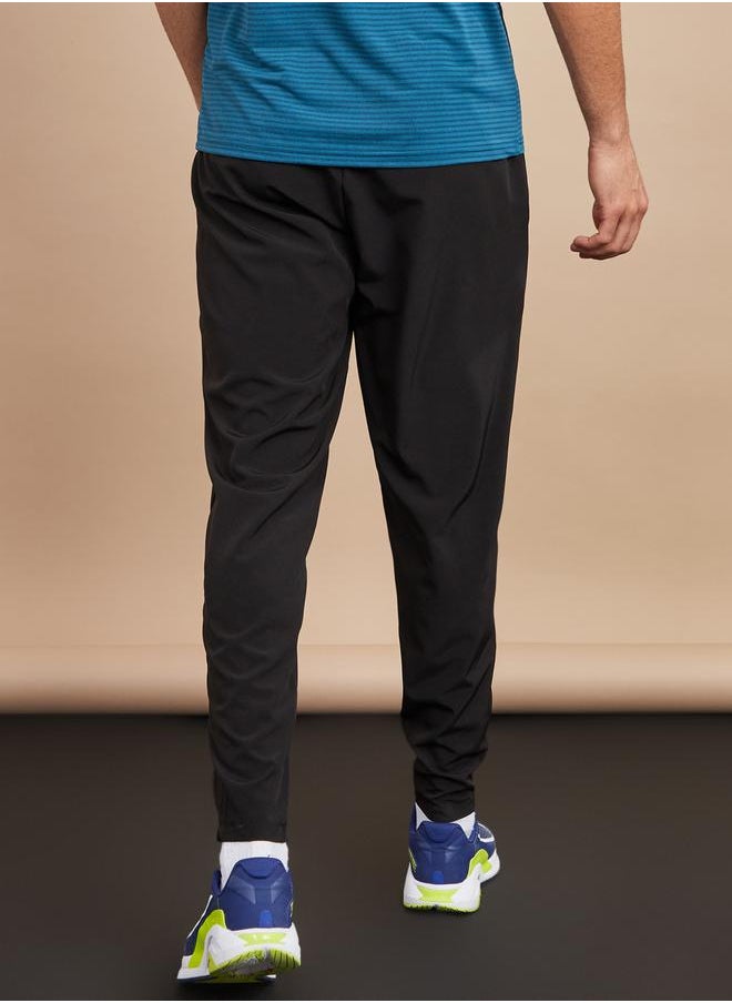 Styli Woven Running Track Pants with Zip Hem  - Image 4