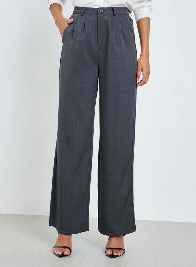 ستايلي بنطال بأرجل واسعة وبكسرات