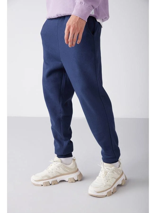 GRIMELANGE Jeremiah Men's Regular Fit Pants with Stretch Fabric, Waist Cord, and Elasticized Pockets, Navy Tracksuit Bottom.