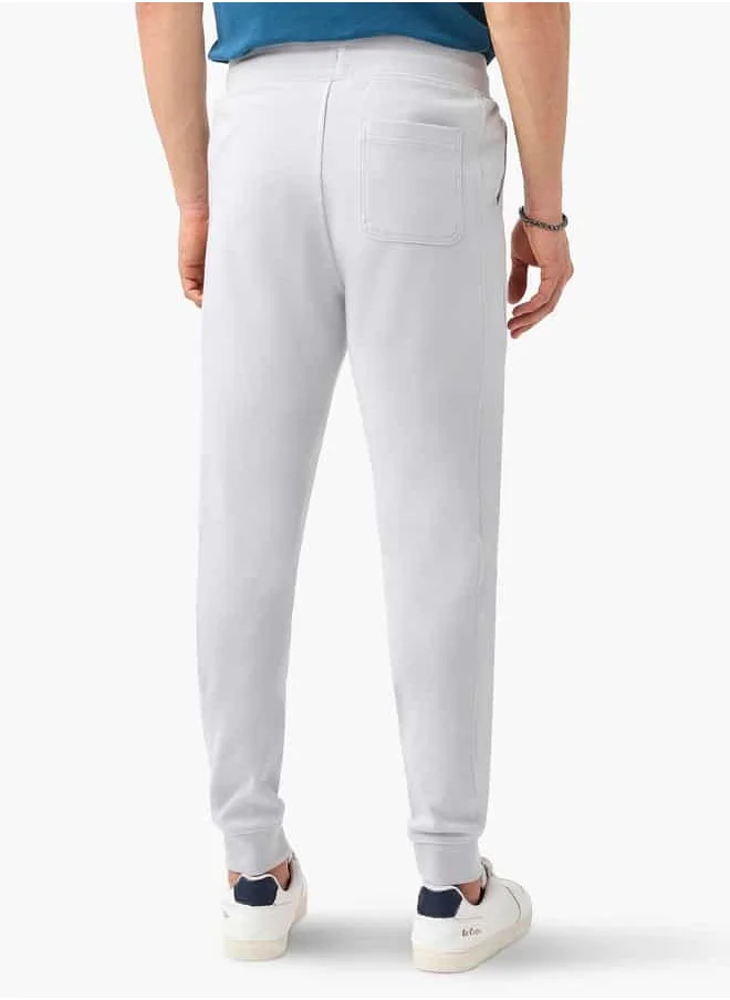 ايكونيك Iconic Panelled Slim Fit Joggers with Drawstring Closure and Pockets