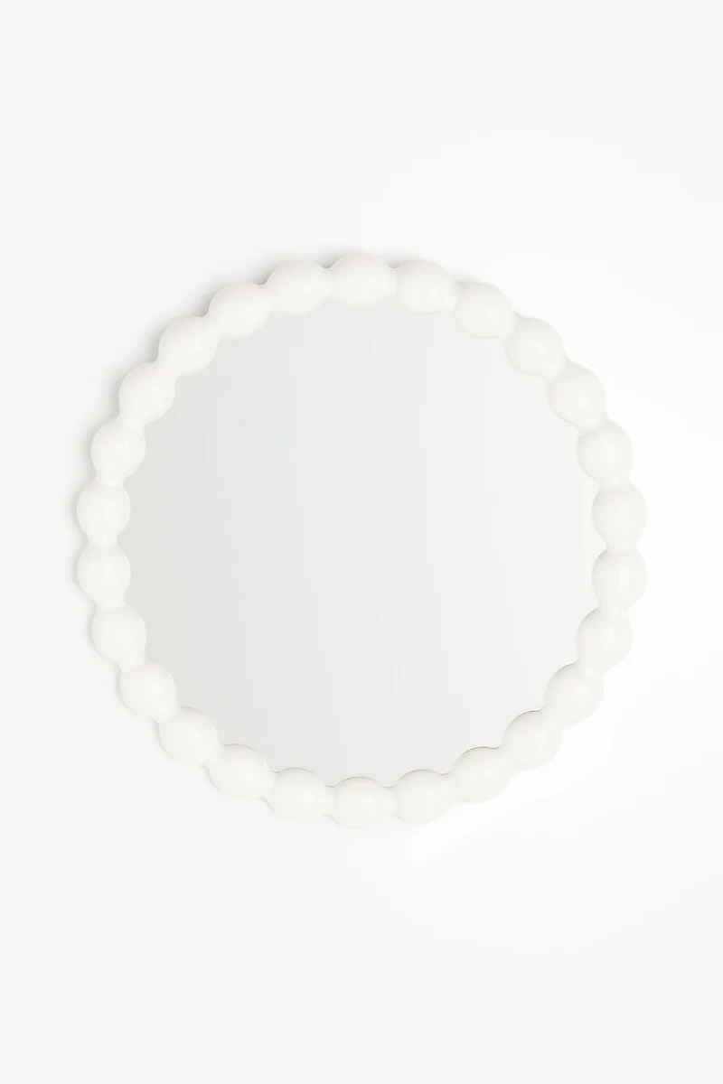 اتش اند ام مرآة بتصميم مستدير