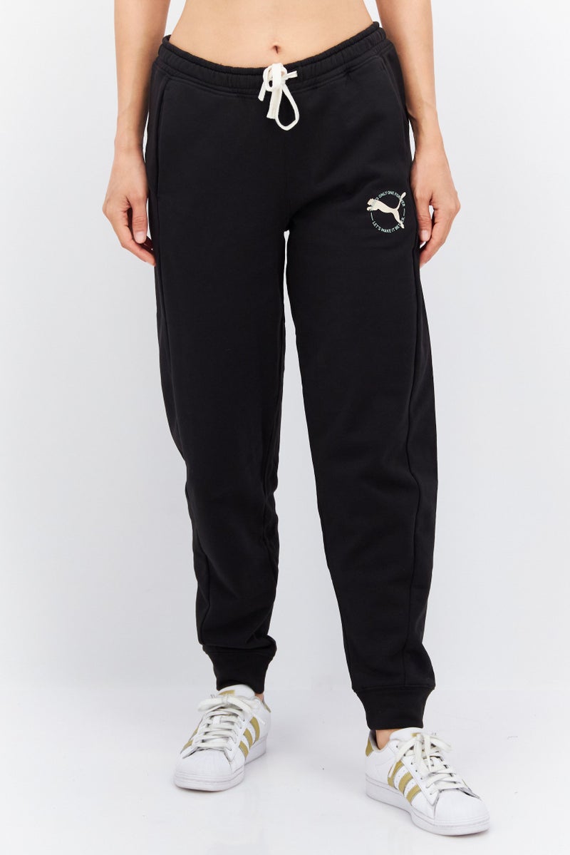 PUMA Women Sportswear Fit Outdoor Sweatpants, Black - Image 1