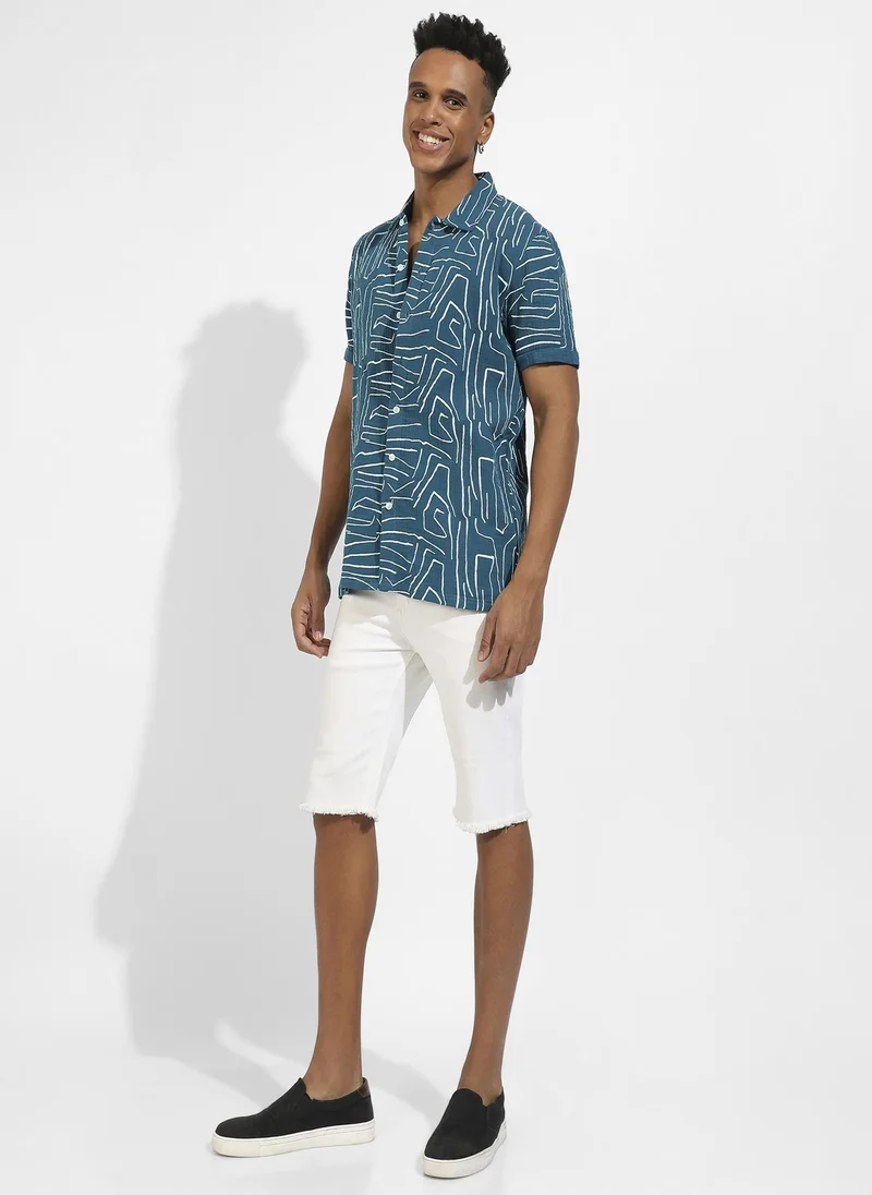 انستافاب بلس قميص بطبعة خطوط مجردة