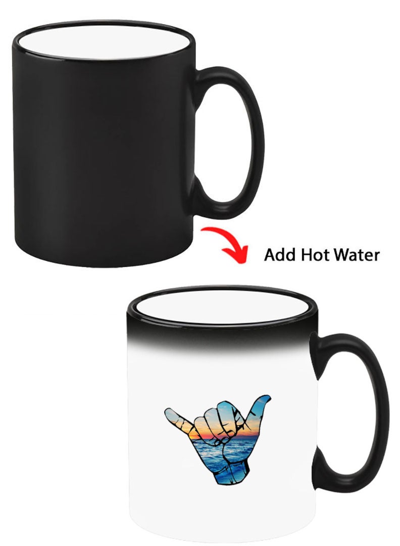 Theodor Color Changing Heat Sensitive Ceramic Mug, Image Revealed When HOT Liquid is Added! Hand - Image 1