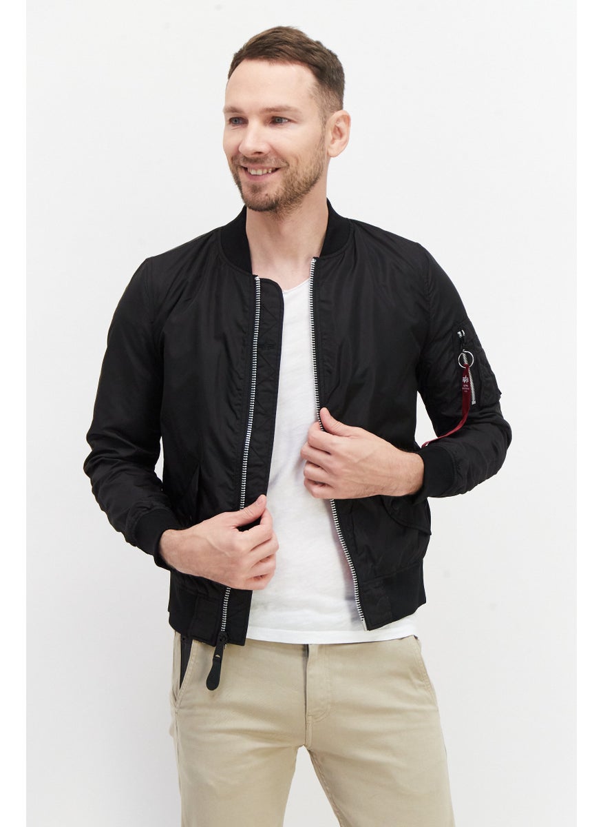 Alpha Industries جاكيت قاذف سوليد للرجال، أسود  - Image 1