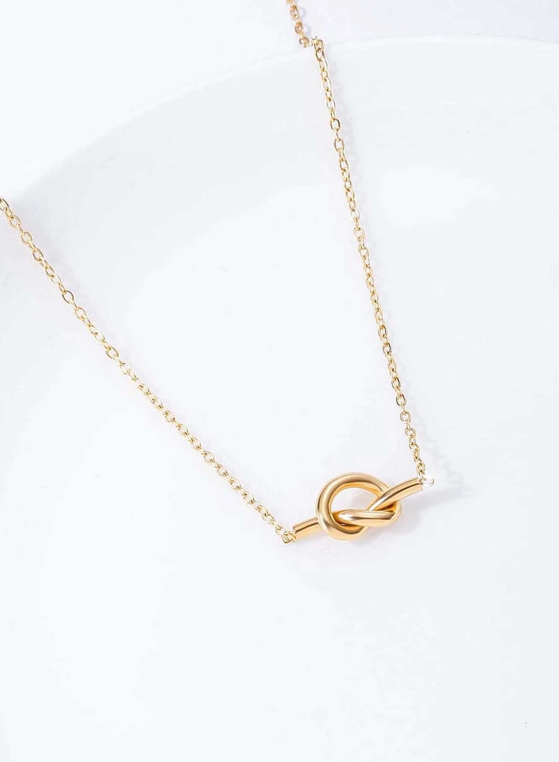 كاف كريشنس قلادة عقدة أنيقة، من الفولاذ المقاوم للصدأ مطلي بالذهب عيار 18 قيراط، سلسلة 42 سم مع تمديد 5 سم للنساء والفتيات - Image 2