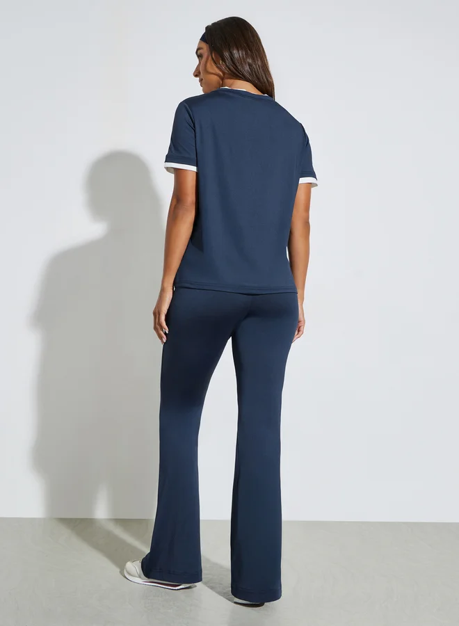 Styli  Dark Blue Double-Layer Collar T-Shirt and Mid Waist Flared Leggings Set for Women | Best Price UAE