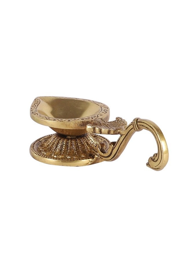 Two Moustaches Ethnic Handcarved Brass Diya with Curved Handle, Brass Diyas for Pooja , Diyas for Home Decor , Gift for House Warming , Golden , Standard , Pack of 1 - Image 4