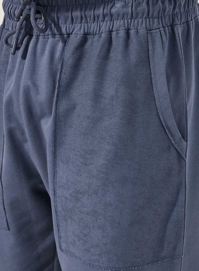 Styli Styli Relaxed Fit Reverse Pocket Open Hem Terry Joggers