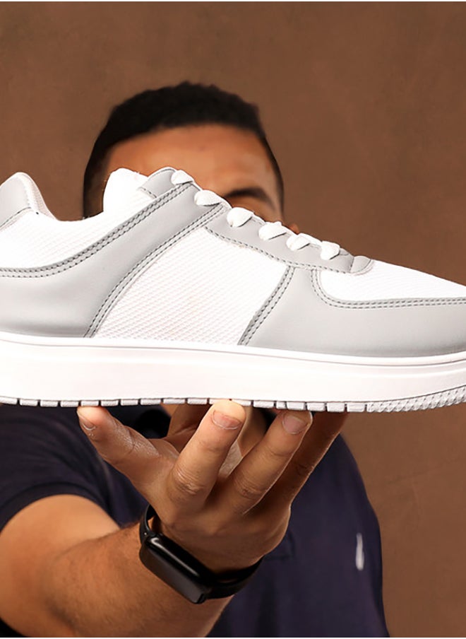 X7 Essential shoe padded with foam, crafted from leather and microfiber fabric