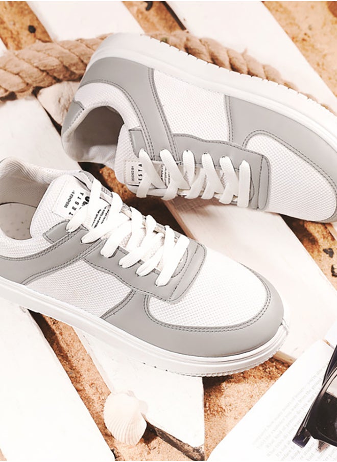 X7 Essential shoe padded with foam, crafted from leather and microfiber fabric