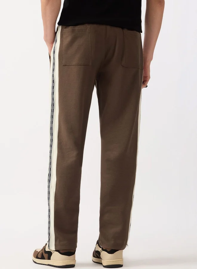 The Souled Store  The Souled Store Men Graphic Printed Straight Fit Joggers  | Best Price UAE