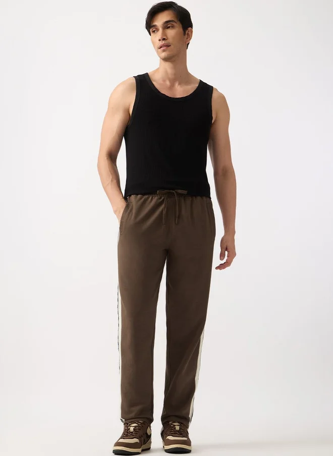 The Souled Store  The Souled Store Men Graphic Printed Straight Fit Joggers  | Best Price UAE
