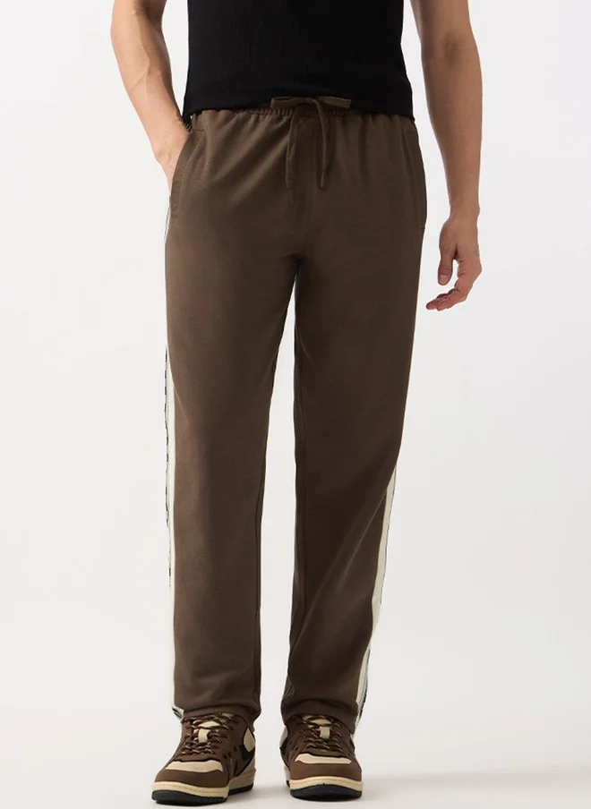 The Souled Store  The Souled Store Men Graphic Printed Straight Fit Joggers  | Best Price UAE