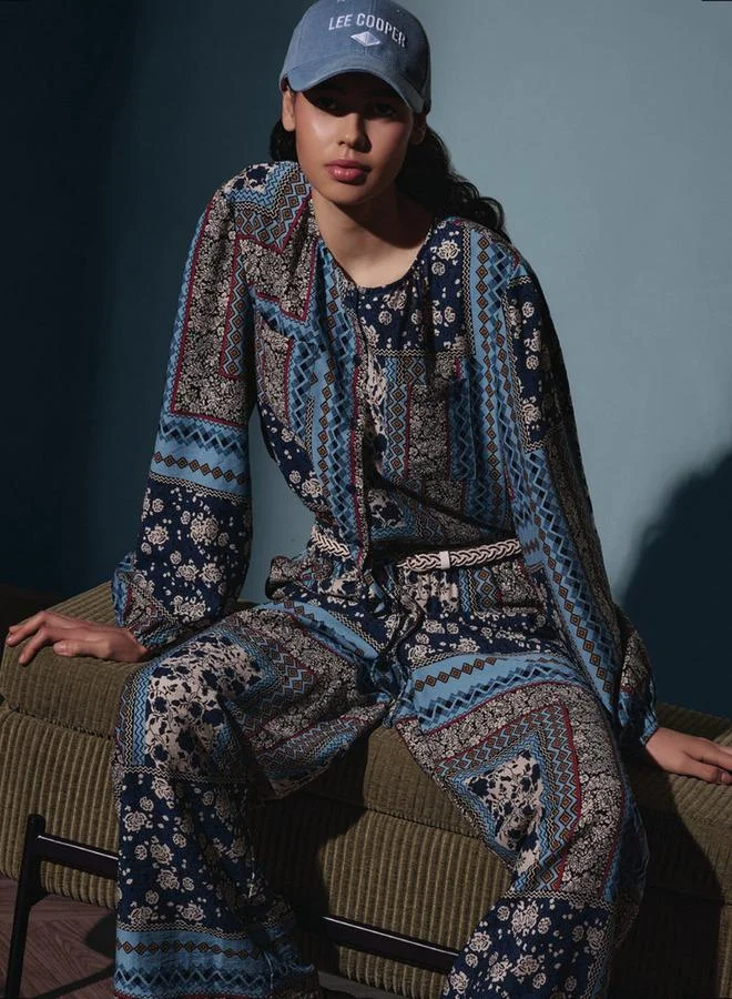 لي كوبر لي كوبر توب بطبعات شاملة وأكمام طويلة مع تفاصيل ربط