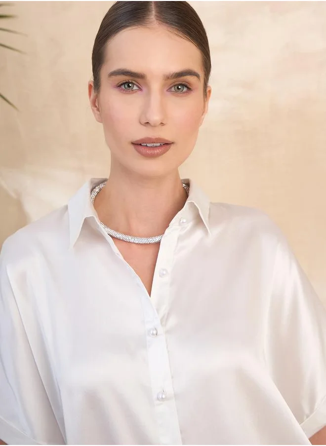Kassually Cut-Out Pearl Embellished Satin Boxy Fit Shirt by Styli