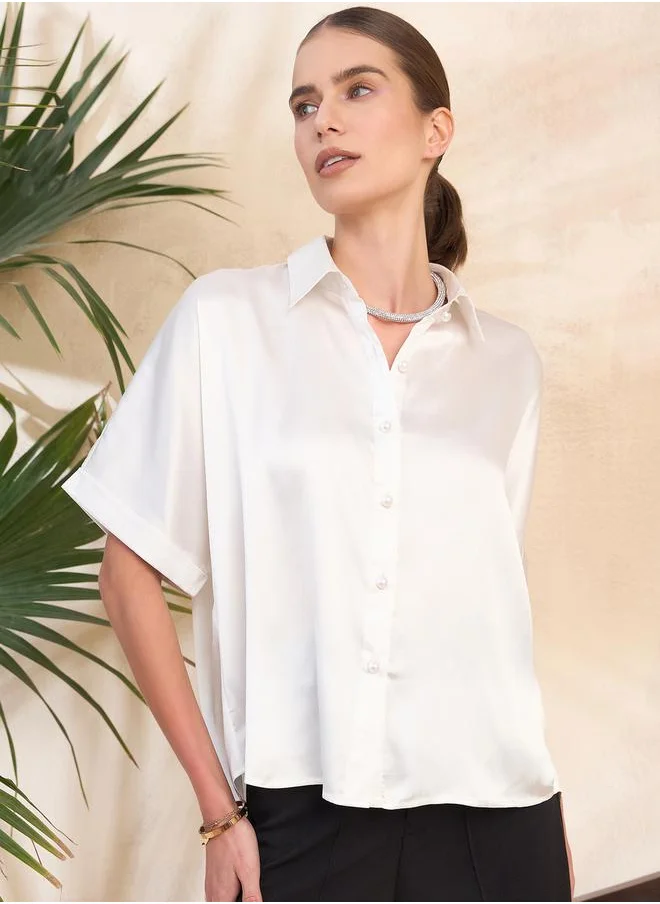 Kassually Cut-Out Pearl Embellished Satin Boxy Fit Shirt by Styli