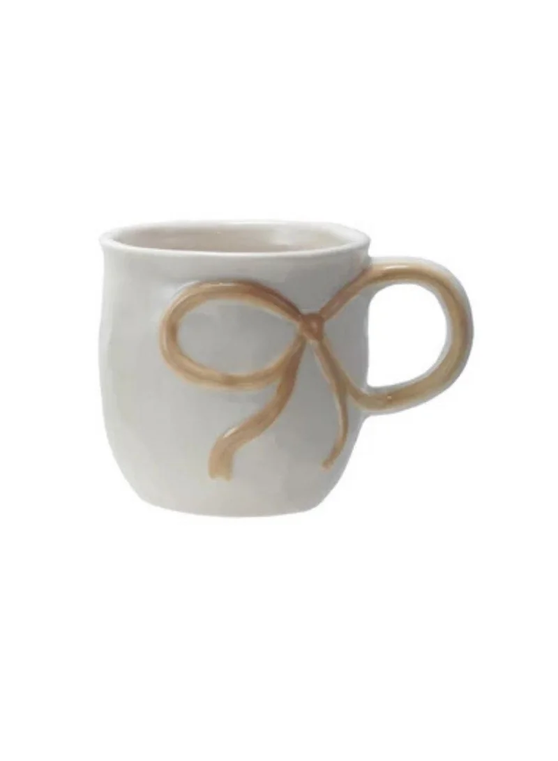 The Saffron Souk 18 oz. Stoneware Mug with Bow Handle, Beige