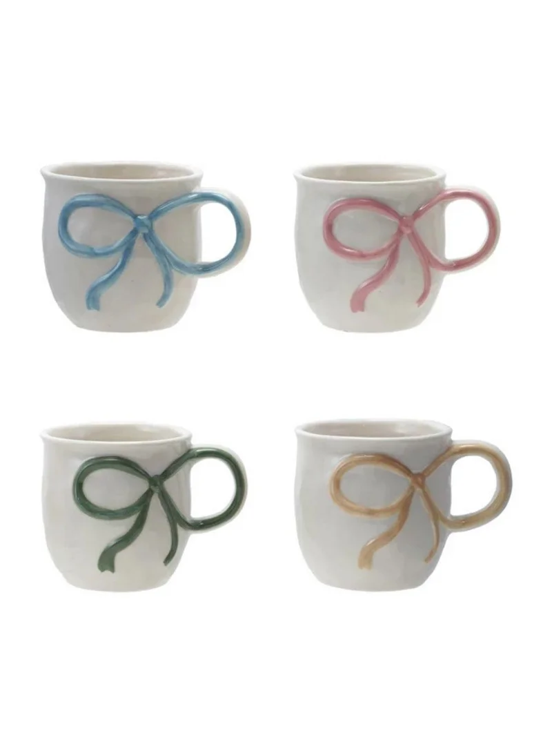 The Saffron Souk 18 oz. Stoneware Mug with Bow Handle, Beige