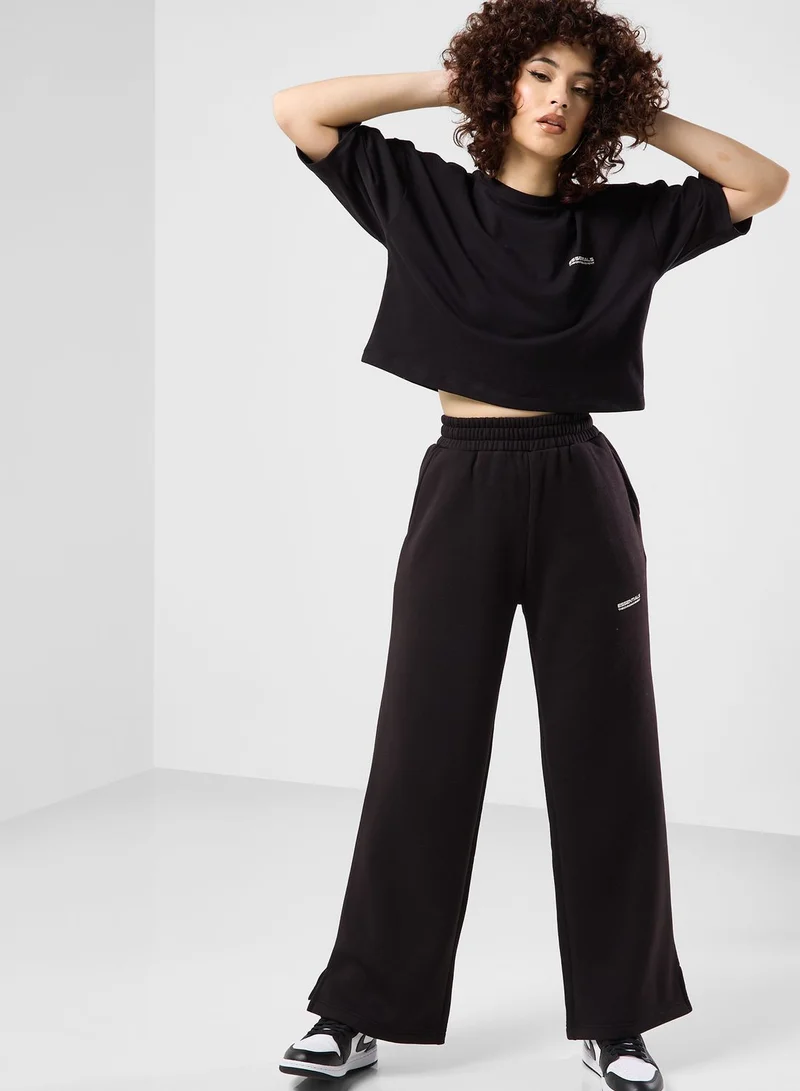 The Giving Movement Wide Leg Logo Joggers
