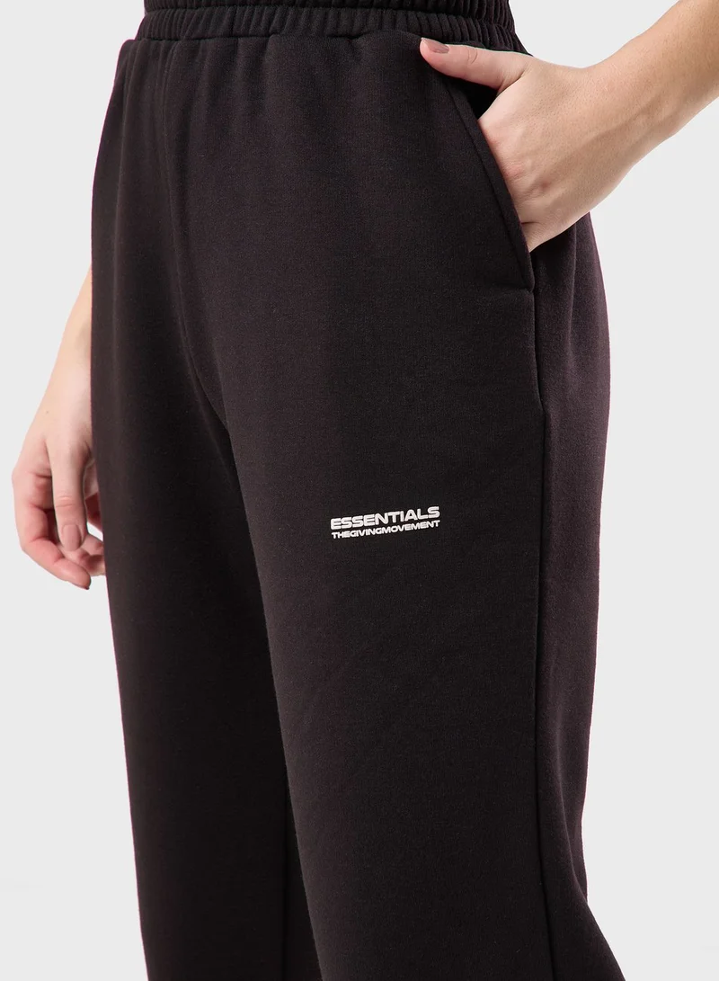 The Giving Movement Wide Leg Logo Joggers