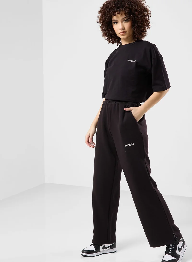 The Giving Movement Wide Leg Logo Joggers