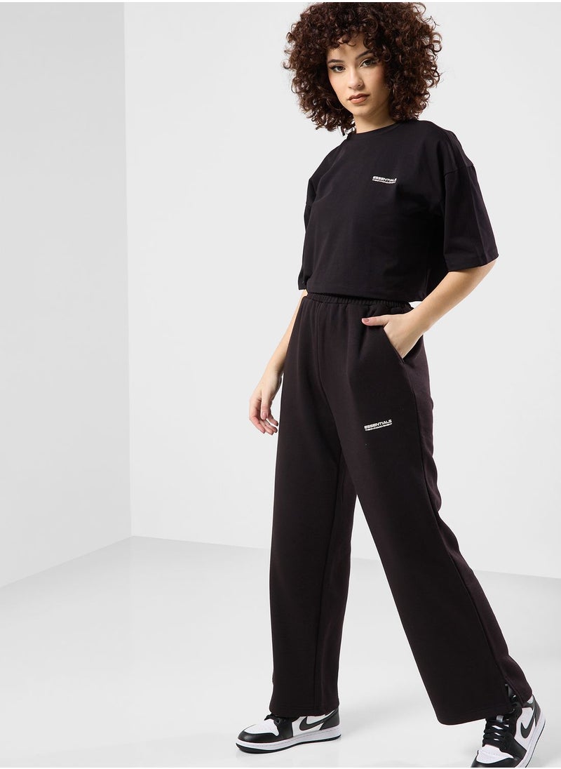 The Giving Movement - Wide Leg Logo Joggers - Image 1