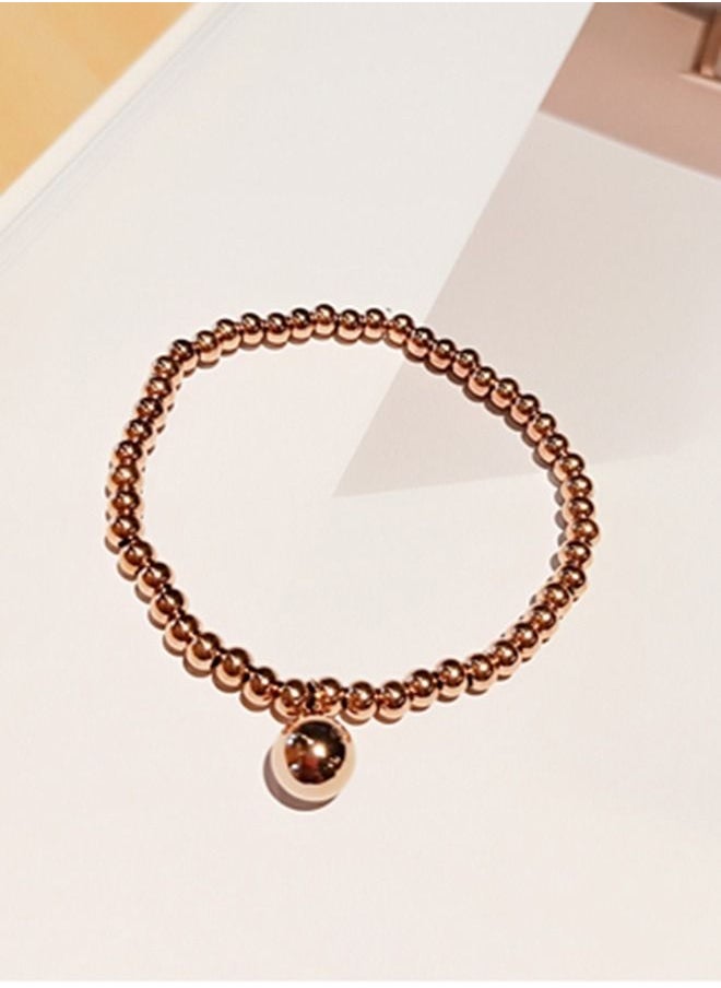 Arabest - Titanium Steel Rose Gold Round Bead Elastic Rope Bracelet - Image 1
