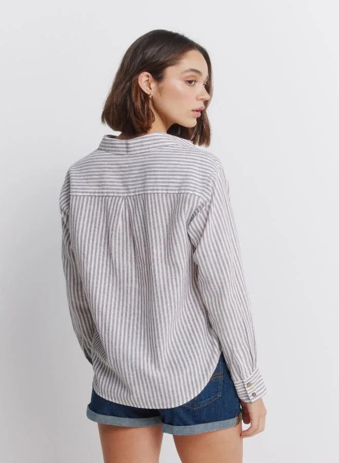 Springfield  Linen long sleeve semi-open V-neck shirt with buttons on cuffs and front. This garment is made with sustainable cotton. for Women | Best Price UAE