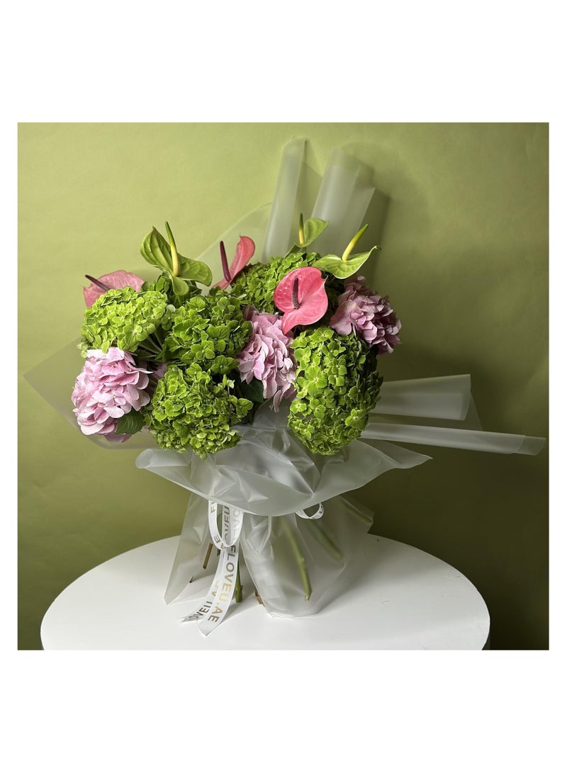 Generic A crystal colour wrapping papper bouqet having green and pink hydrangeas and pink and green anthurims.