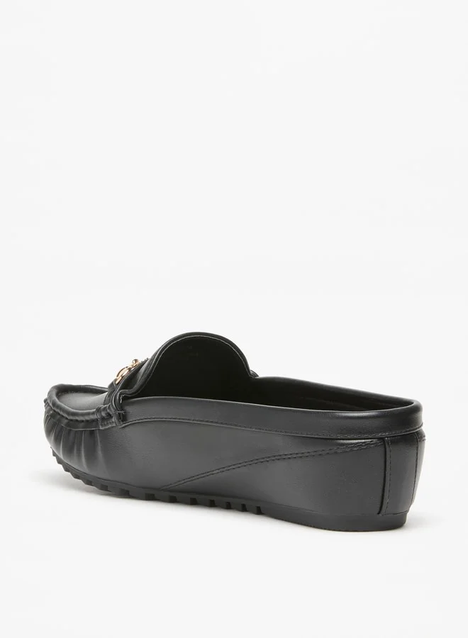 فلورا بيلا من شو إكسبرس Women's All-Over Print Mules with Metal Accent