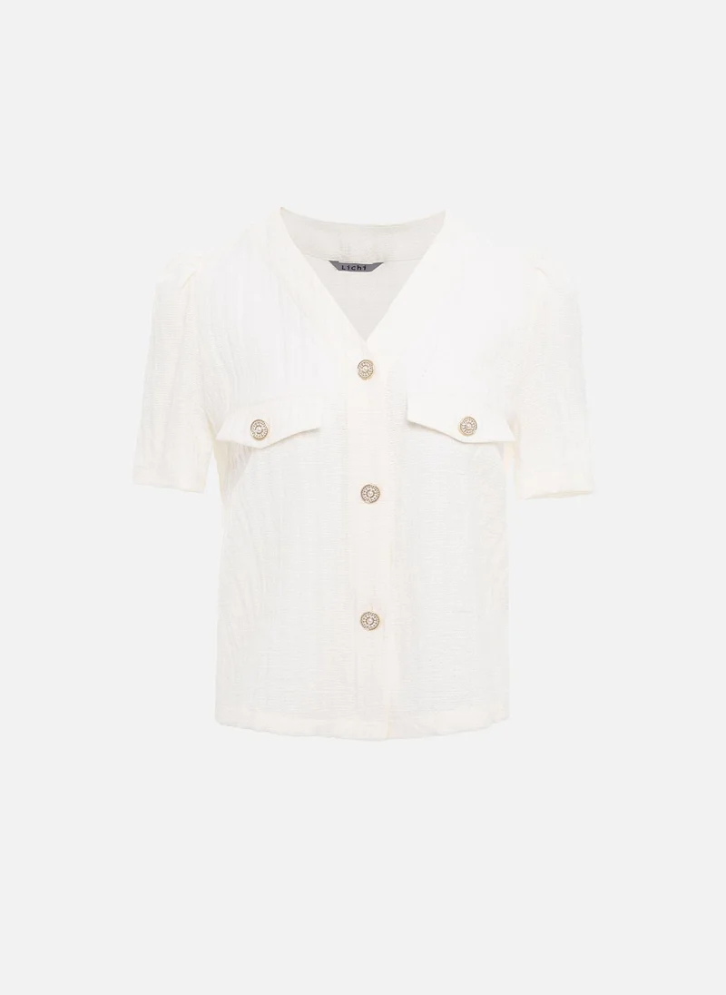 Lichi Short-sleeved blouse in textured fabric