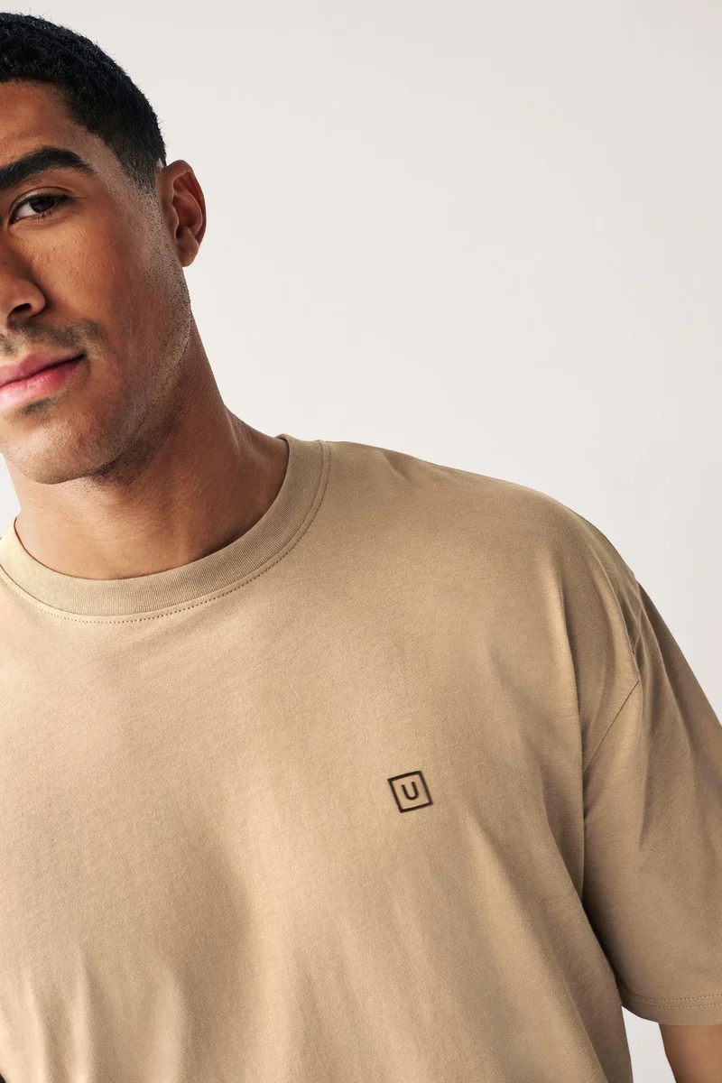 Urbano Fashion  Urbano Fashion Men's Ginger Brown Solid Round Neck Oversized Half Sleeve Cotton T-Shirt  | Best Price UAE