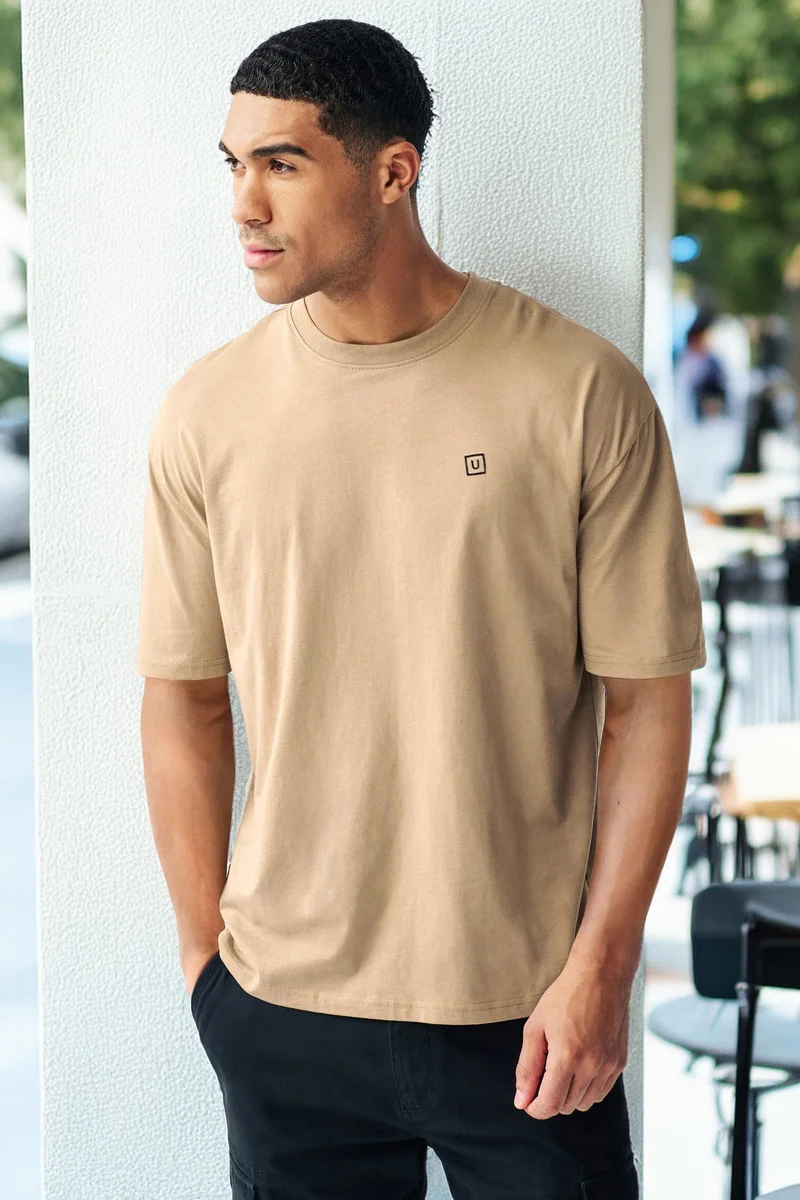 Urbano Fashion  Urbano Fashion Men's Ginger Brown Solid Round Neck Oversized Half Sleeve Cotton T-Shirt  | Best Price UAE