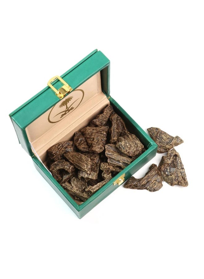 Premium Double Super Blue Kalimantan Oud – A luxury Italian leather box containing one ounce of premium Blue Oud, featuring the "Two Swords and Palm Tree" emblem. - Image 1