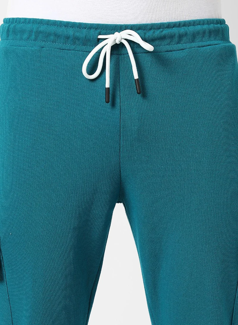 Campus Sutra Men's Solid Aqua Blue Regular Fit Trackpants
