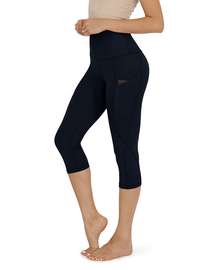 ODODOS Women's High Waisted Yoga Capris with Pockets,Tummy Control Non See Through Workout Sports Running Capri Leggings, Plus Size, Deep Navy,XX-Large - Image 1