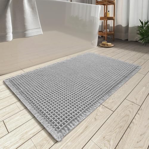 AMOAMI Upgraded Waffle Bath Mat, Super Absorbent Non Slip Bath Mats for Bathroom Floor, Machine Washable Bathroom Rugs with Tassels, Rubber Backed Bathroom Mats, Ultra Soft, 18" x 30", Grey - Image 1