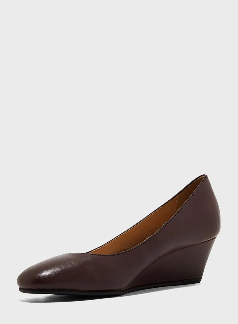 Hush Puppies Round Toe Wedge Pumps