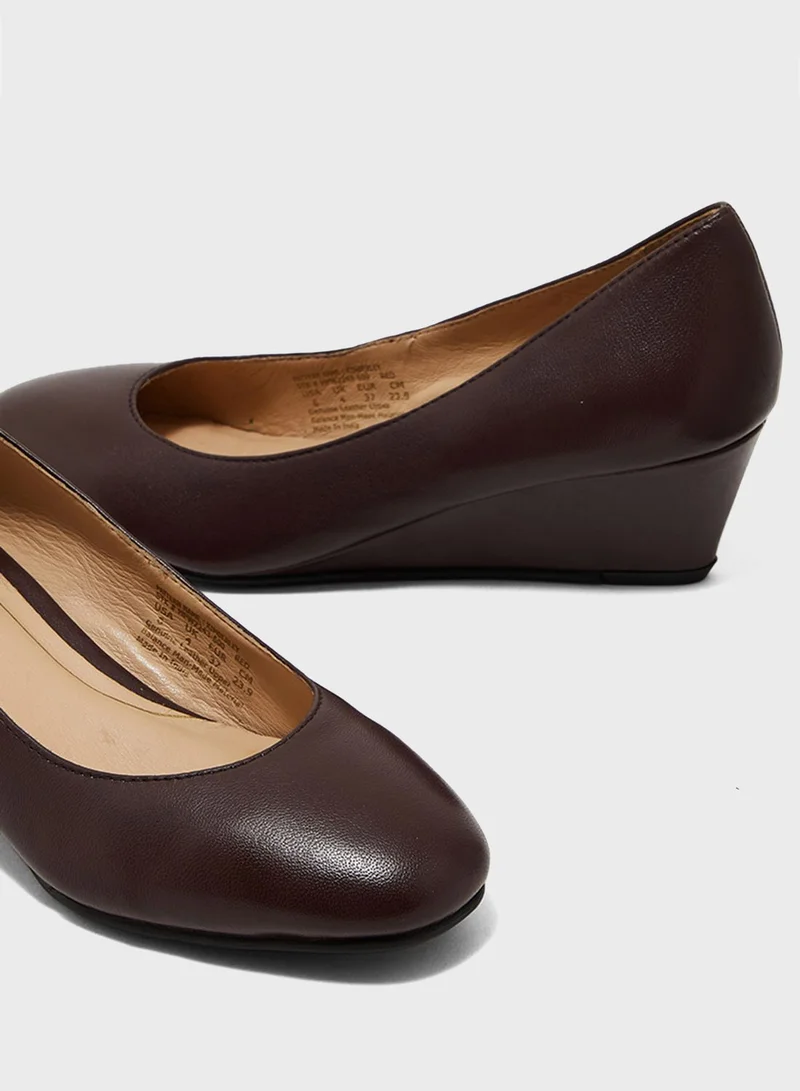 Hush Puppies Round Toe Wedge Pumps