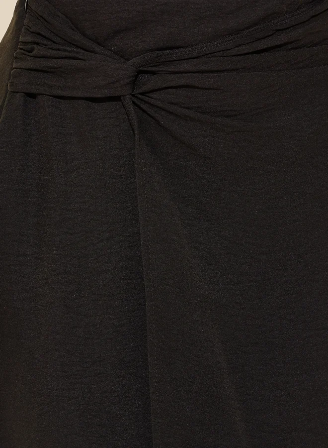 Take Two Solid Asymmetric Hem Maxi Skirt with Twist Detail
