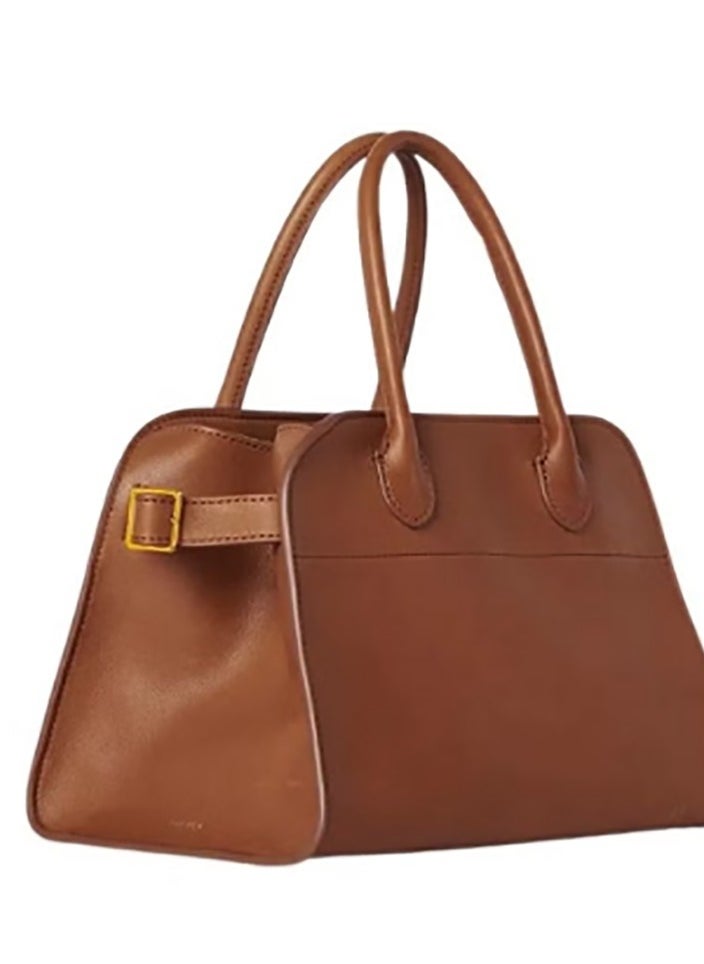 The Row Margaux 10 Top-Handle Bag in Plain Leather - pzsku/Z919B7A157D7C97466D91Z/45/_/1737699368/5506bbfa-a656-42c7-a5fd-6452ec5e14f3