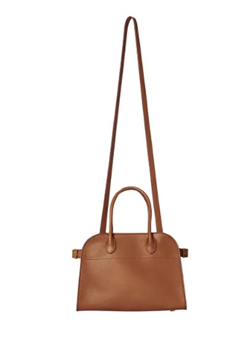 The Row Margaux 10 Top-Handle Bag in Plain Leather - pzsku/Z919B7A157D7C97466D91Z/45/_/1737699369/182c5550-044f-46ca-a3b8-4b6fd13f9ee2