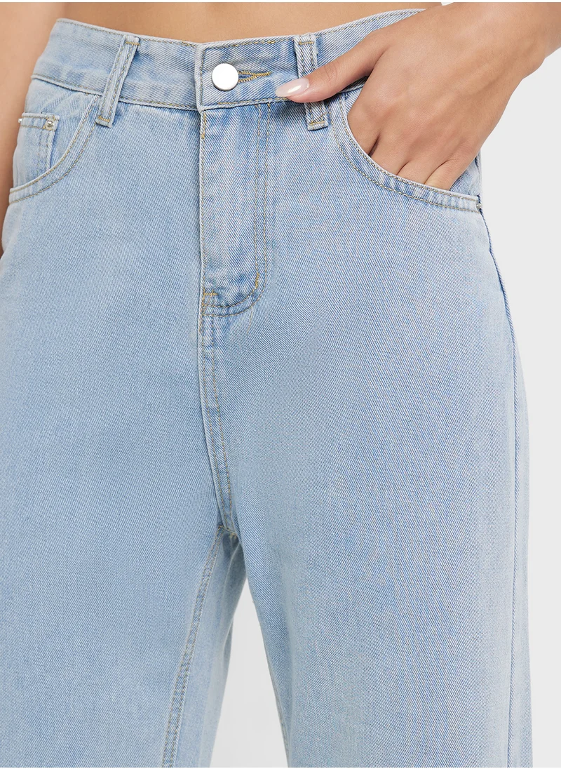 جينجر High Rise Wide Leg Bleached Jeans