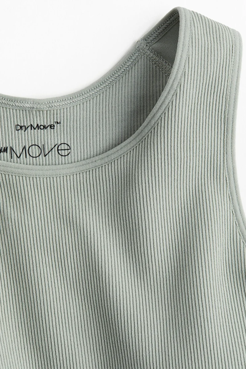 اتش اند ام حمّالة صدر رياضية بإسناد متوسط من قماش DryMove™